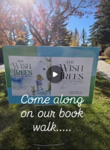 Outdoor StoryWalk display featuring The Wish Trees children's book at Prince of Wales School in Calgary.